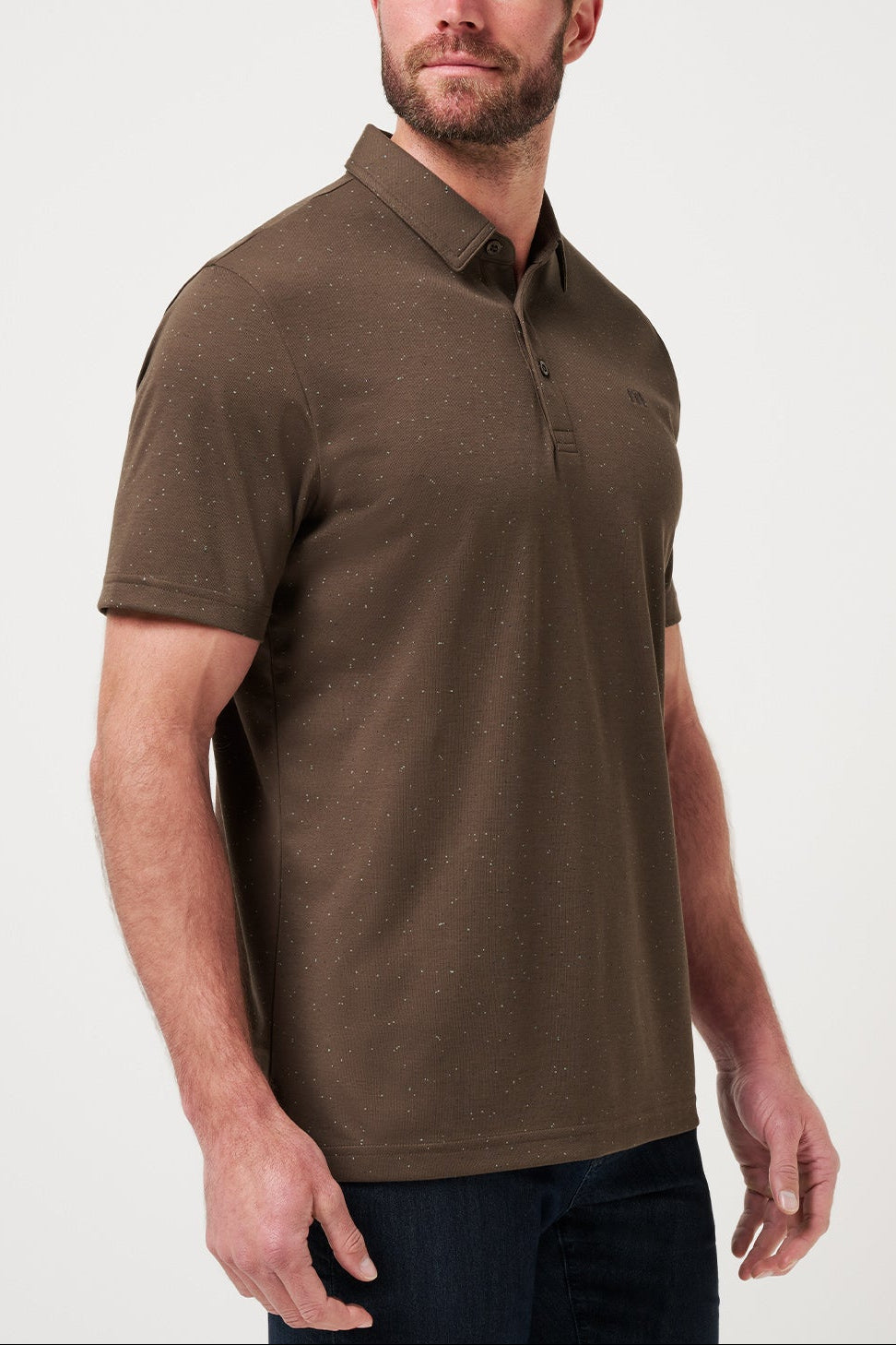 Man wearing a brown polo shirt against a white background