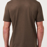 Man wearing a brown polo shirt on a white background