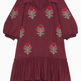 Maroon dress with floral embroidery on a white background