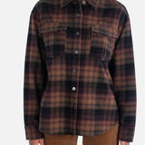 Woman wearing a plaid shirt on a white background