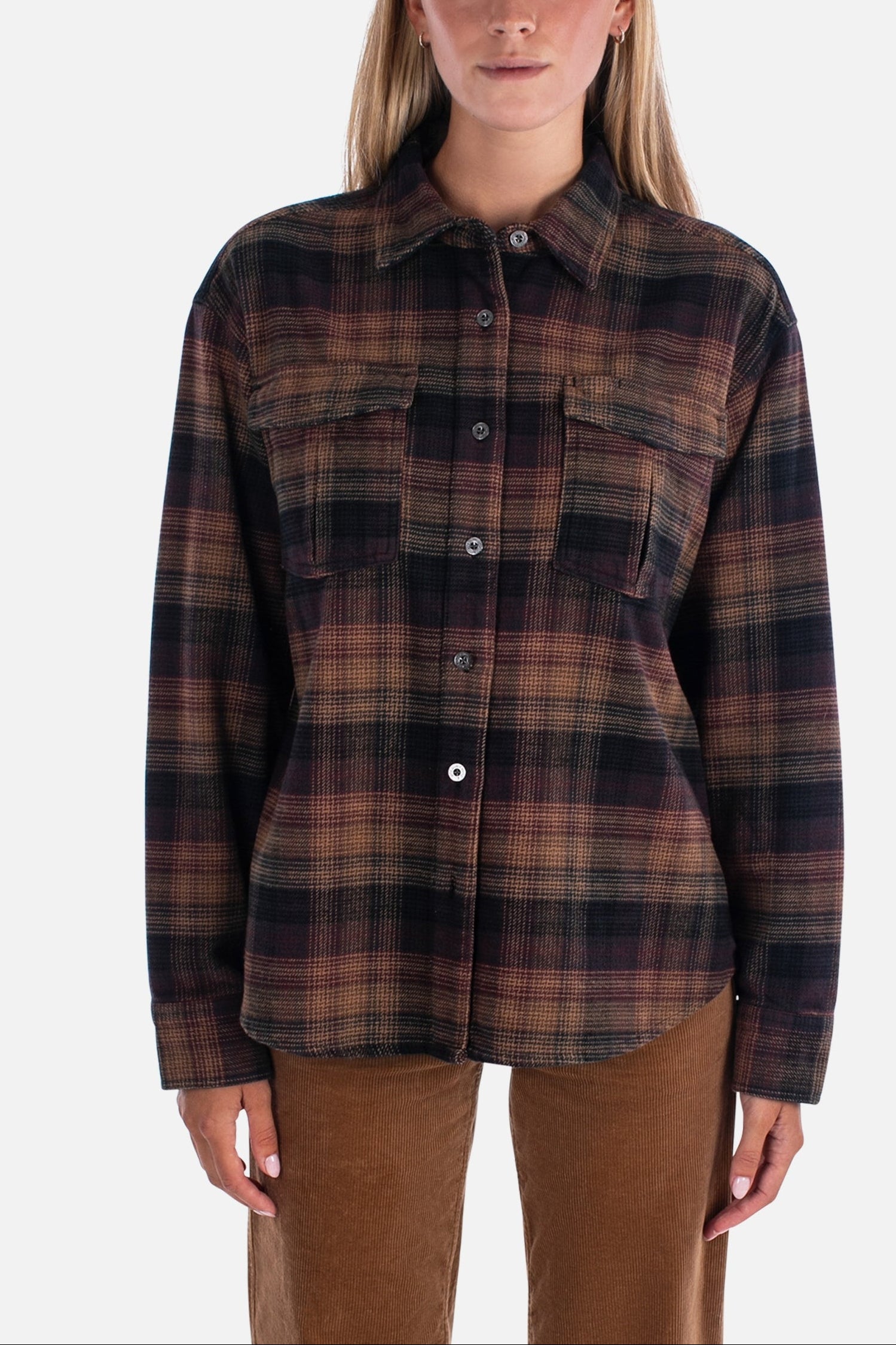 Woman wearing a plaid shirt on a white background