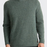 Man wearing a green sweater on a white background