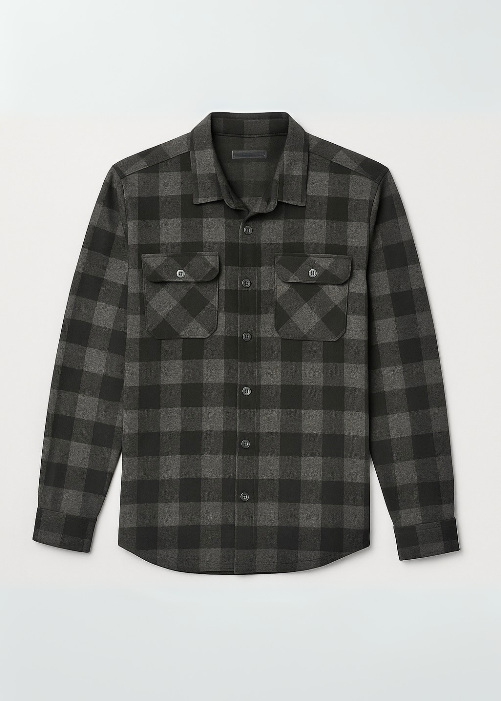 Plaid shirt with two front pockets on a light gray background