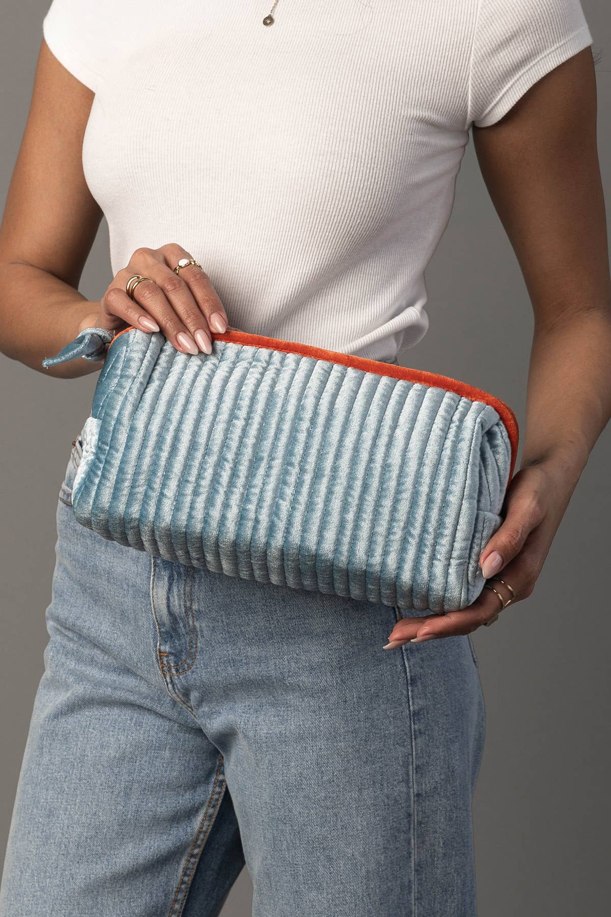 Juniper Velvet Ribbed Pouch in light blue and orange