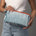 Juniper Velvet Ribbed Pouch in light blue and orange