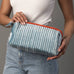 Juniper Velvet Ribbed Pouch in light blue and orange