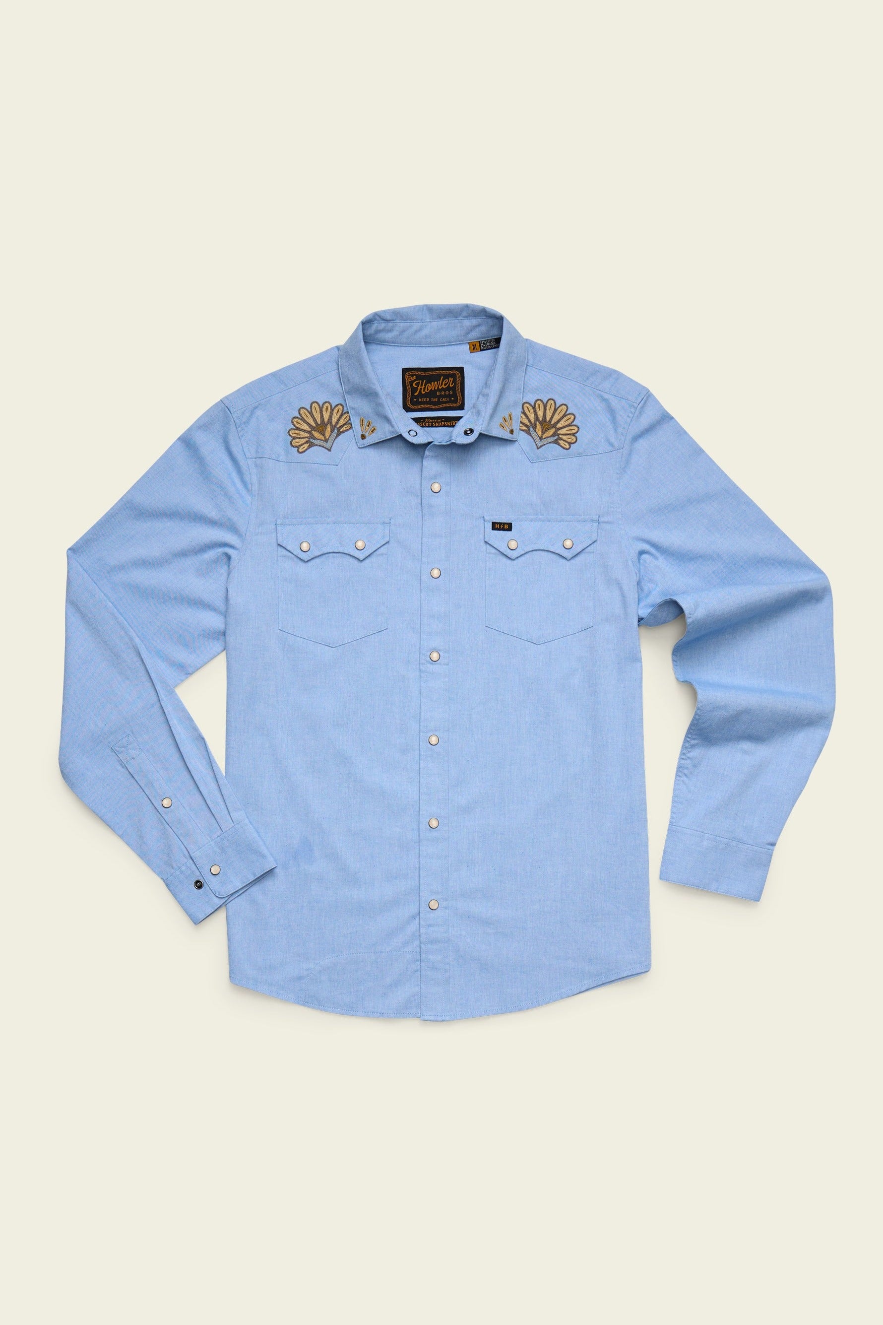 Howler Bros Crosscut Deluxe Snapshirt in Fanned Flora Faded Blue Oxford, front