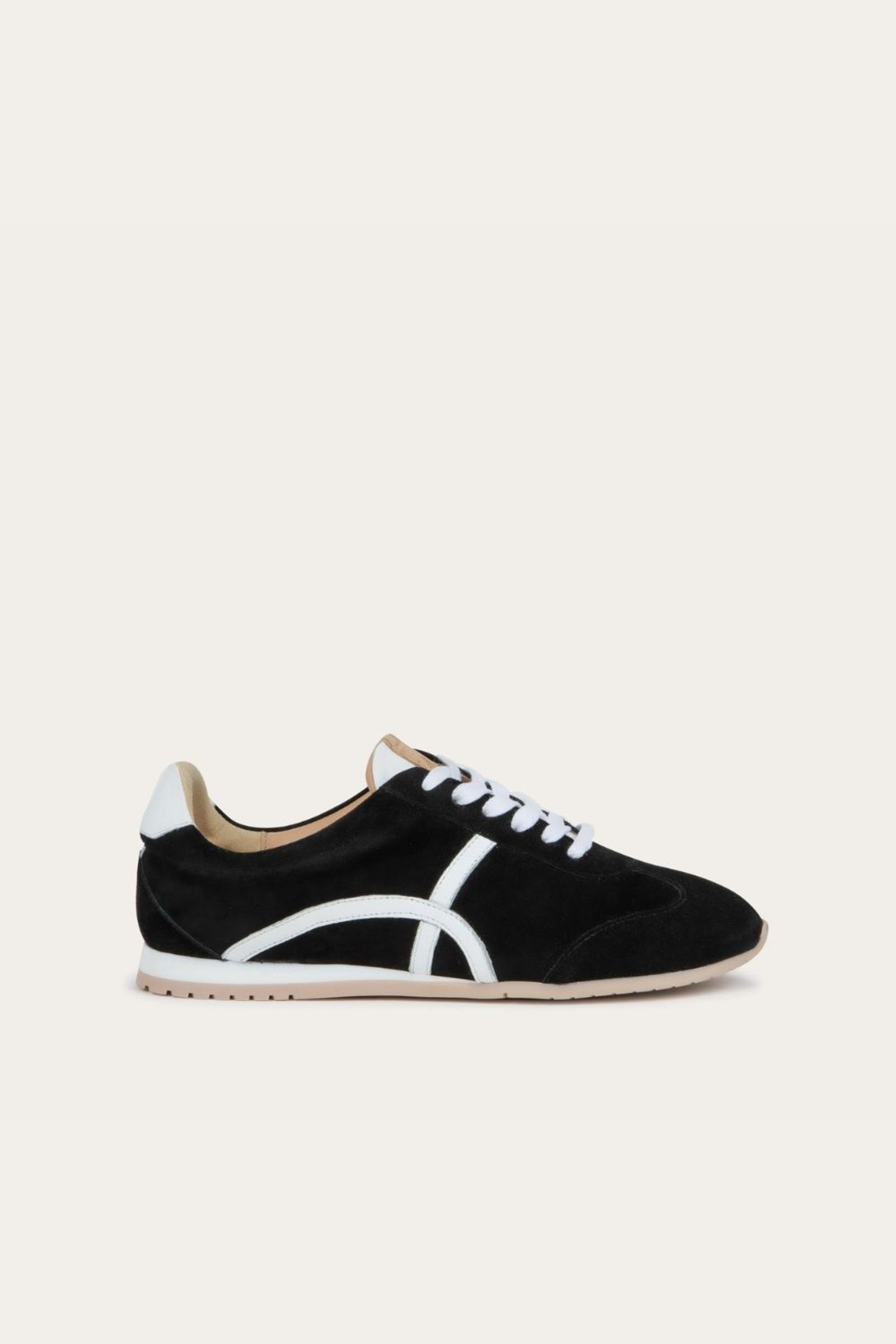 Naot Haven sneaker in Black and White Combo, side view