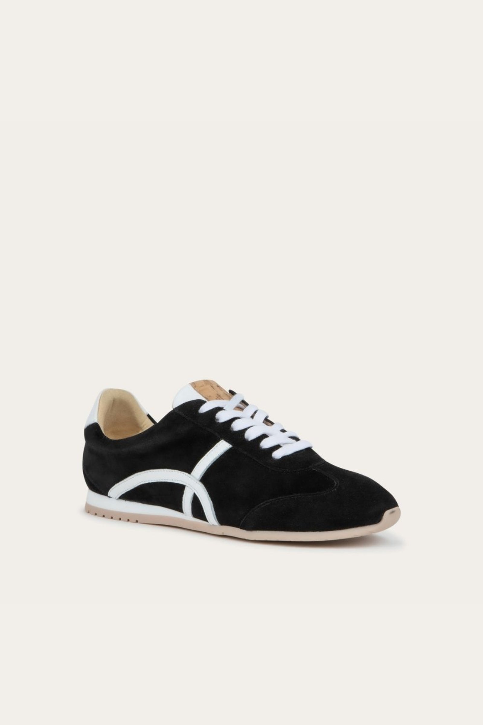 Naot Haven sneaker in Black and White Combo, angled view