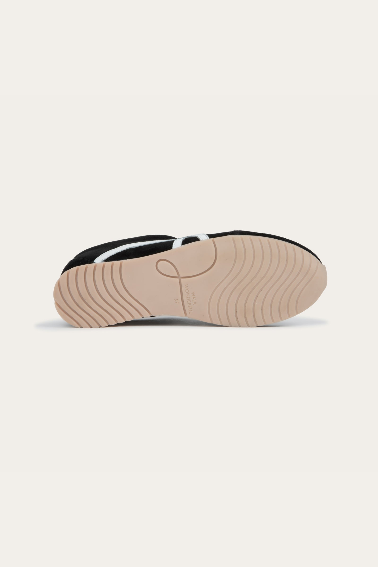 Naot Haven sneaker in Black and White Combo, back view