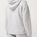 Person wearing a gray hoodie and shorts set on a white background