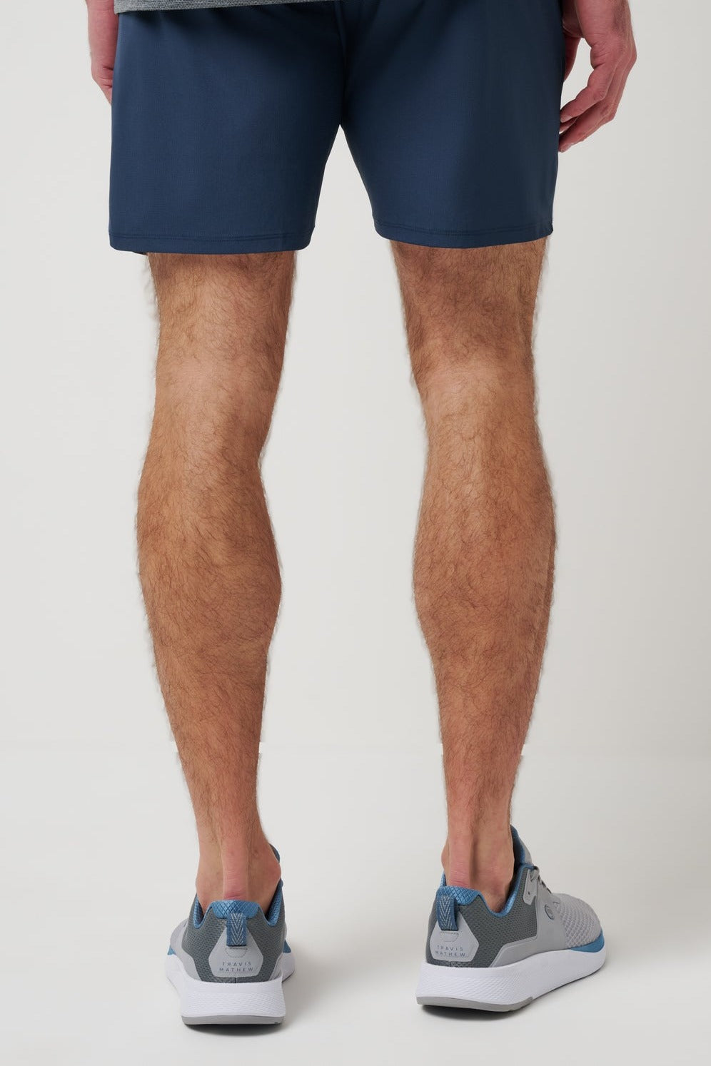 Travis Mathew Wanderlust E-Waist Short 7.5In in Mood Indigo, back view