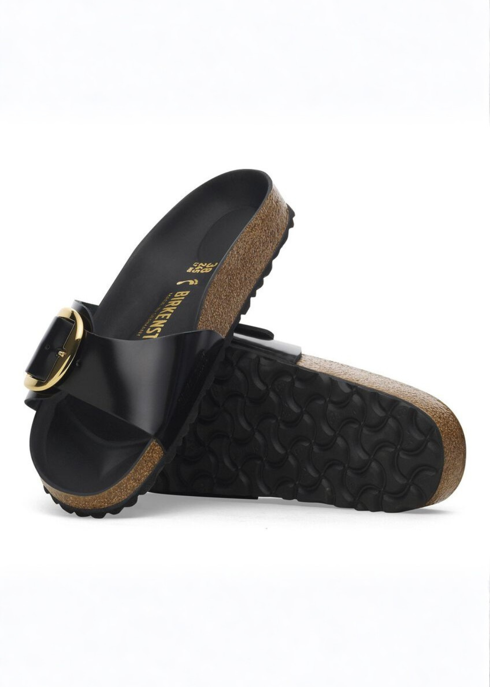 Black birkenstock sandals with cork sole on a white background