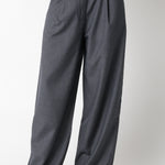 Gray wide-leg pants worn by a person on a white background