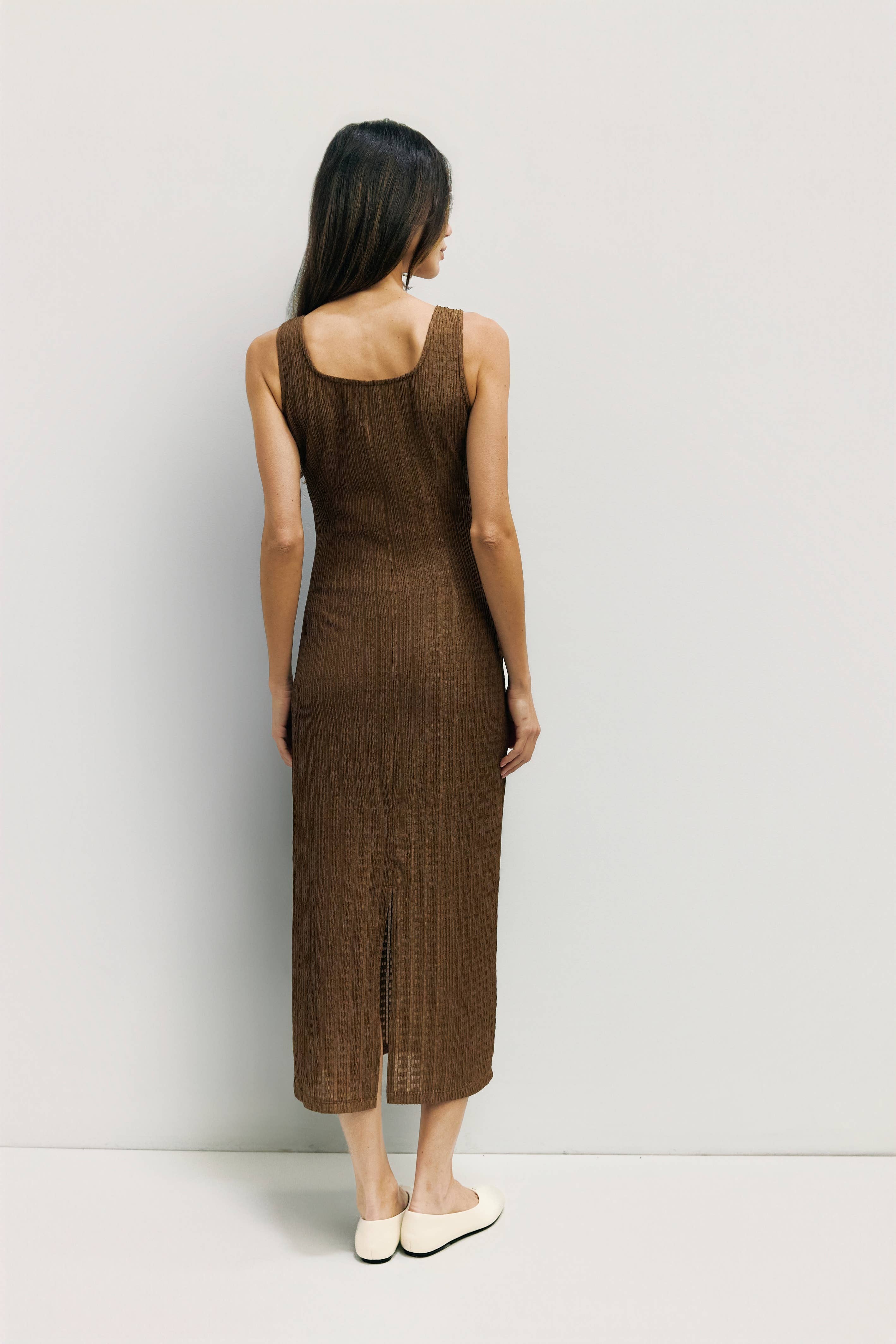 Textured knit midi dress in brown, back view with center slit