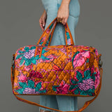 Wildflower Woven Duffel in burnt orange floral, side
