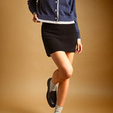 Mini Heart Crew Socks styled with loafers and a mini skirt
