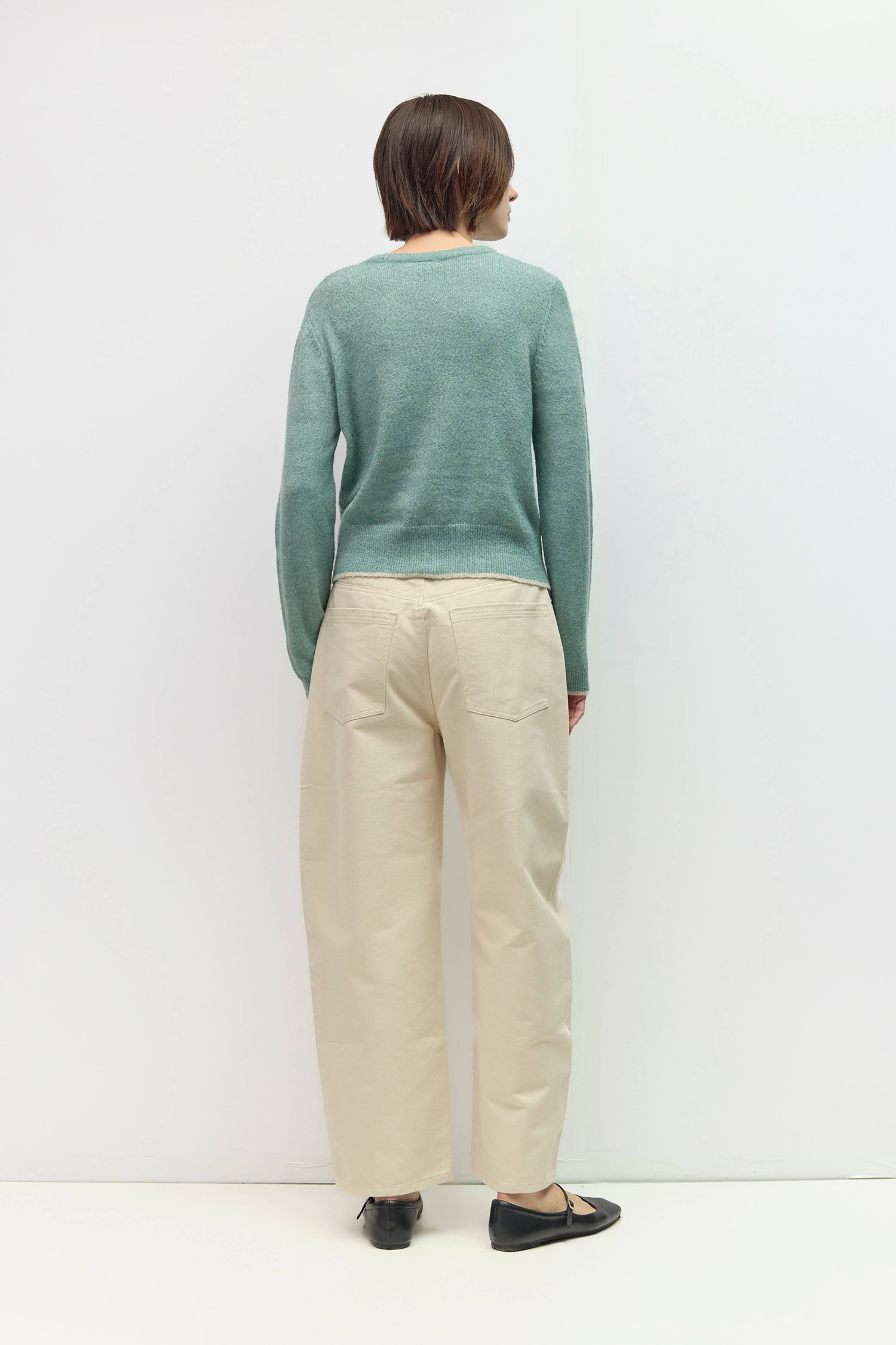 Knit cardigan with contrast trim, back view