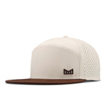 Melin Trenches Icon Hydro flat bill hat in Frosted Birch, angled front view