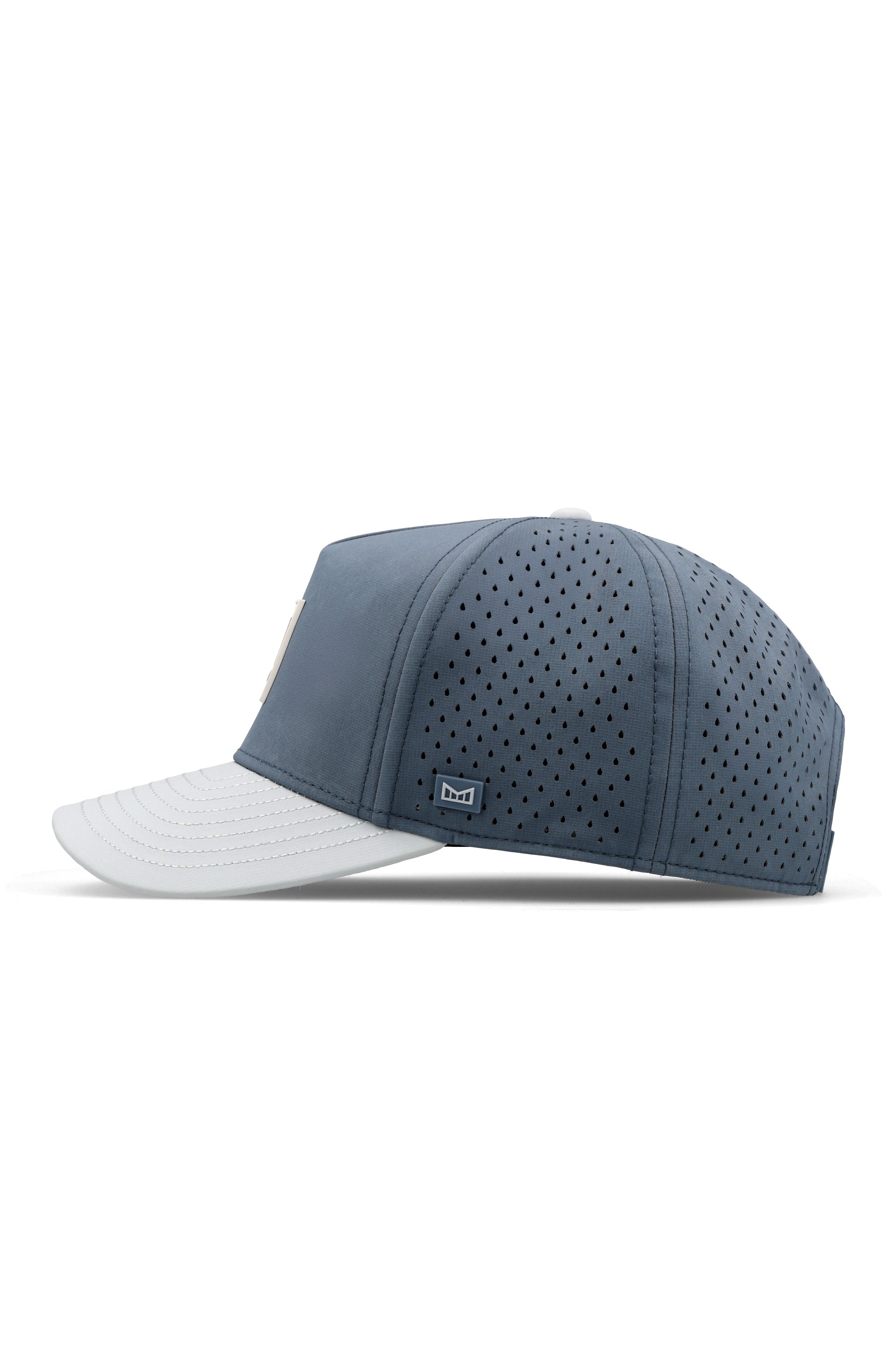 The side view of the melin Split Fit Odysea Stacked Hydro hat in clear lake