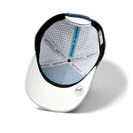 The inside view of the melin Split Fit Odysea Stacked Hydro hat in clear lake