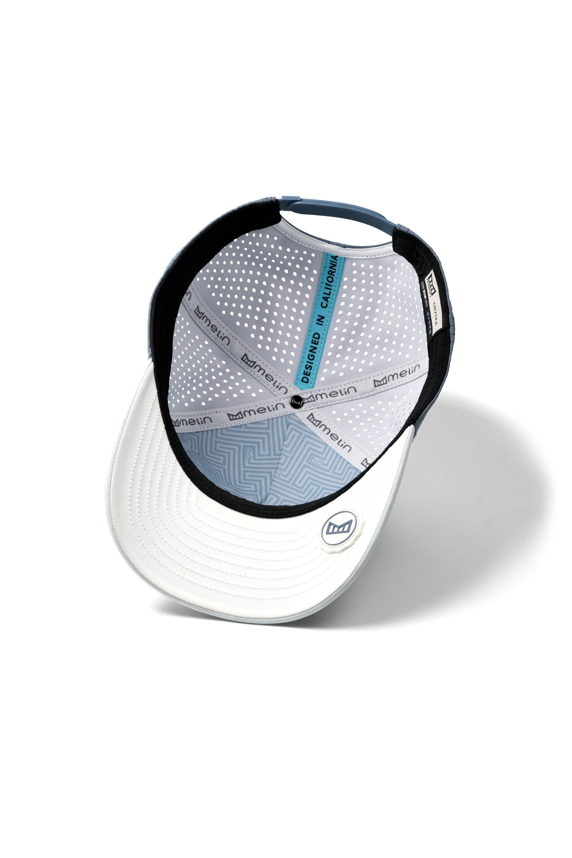 The inside view of the melin Split Fit Odysea Stacked Hydro hat in clear lake