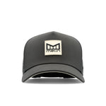 The frontal view of the melin Split Fit Odysea Stacked Hydro hat in faded black
