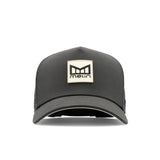 The frontal view of the melin Split Fit Odysea Stacked Hydro hat in faded black