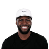 melin Coronado Brick Hydro snapback hat in White - worn by model