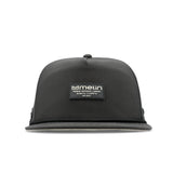 The frontal view of the melin Split Crushed Fit Coronado Brick Hydro hat in faded black