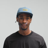 melin Hydro Coronado Brick snapback hat in Blue Stone Gum - lifestyle view