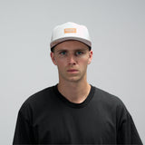 melin Hydro Coronado Brick snapback hat in White Gum - lifestyle view