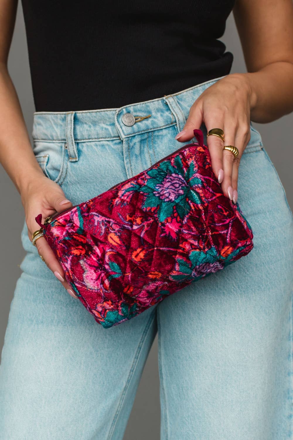 Wildflower Woven Travel Pouch in burgundy floral, held