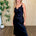 Marlowe Satin Lace V-Neck Midi Dress in Black, hand on hip