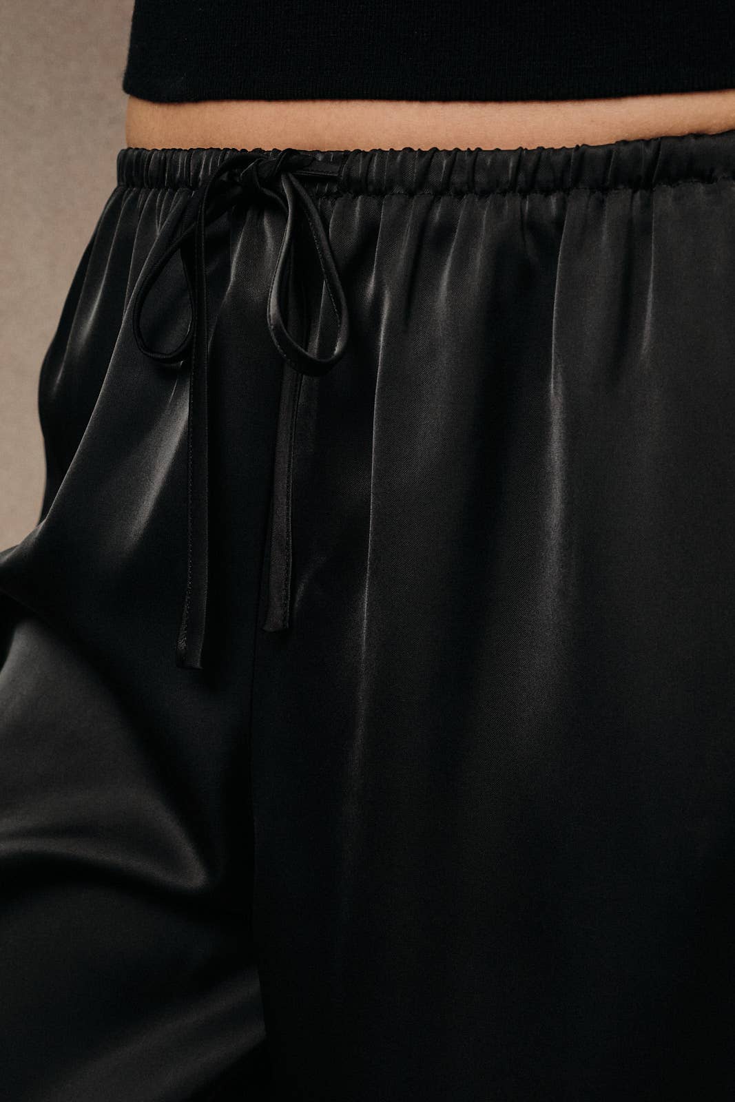 Firelight Satin Lace Hem Pants in Black, drawstring waist detail
