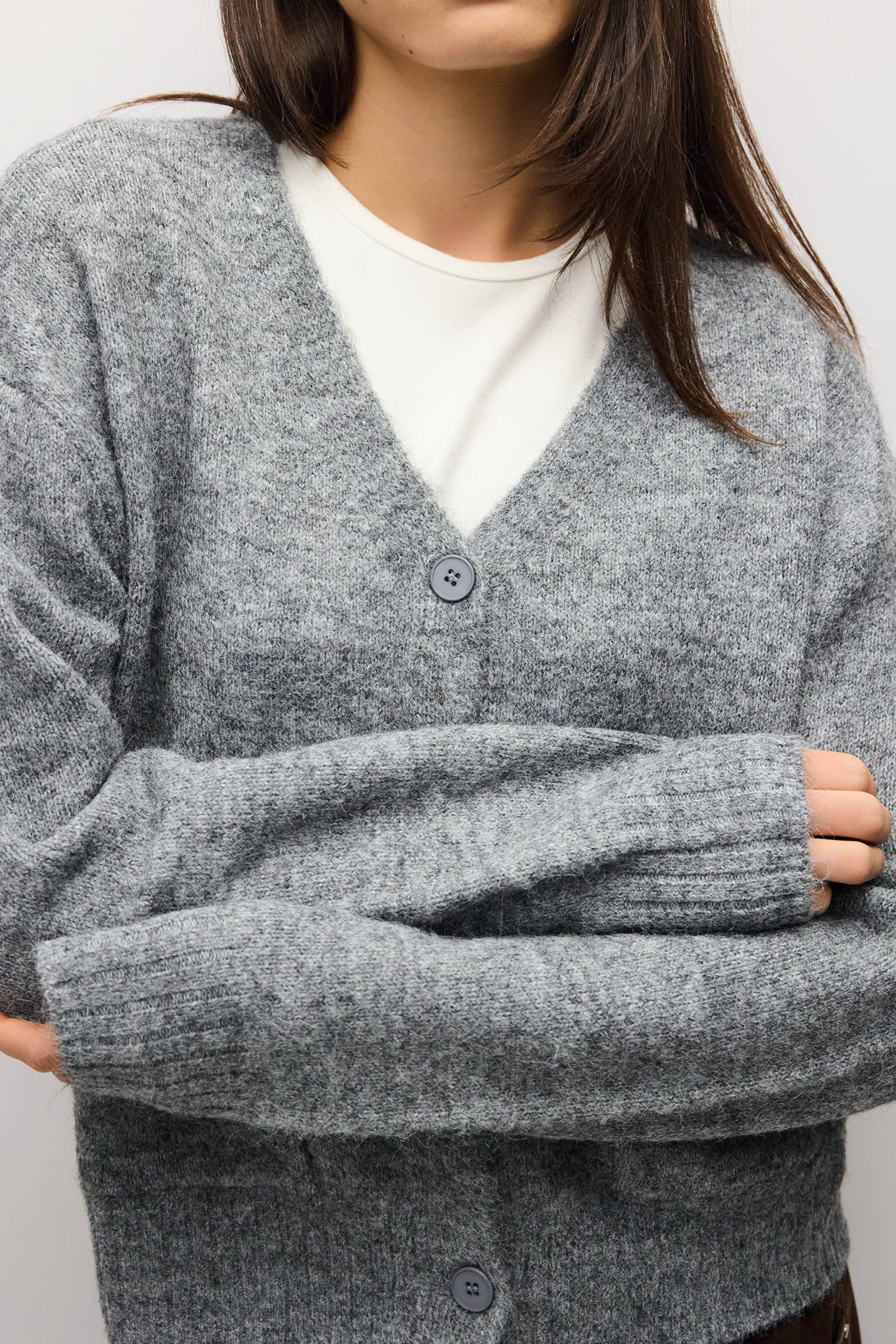 HGREY 5 close up of heather grey fuzzy knit and V neckline