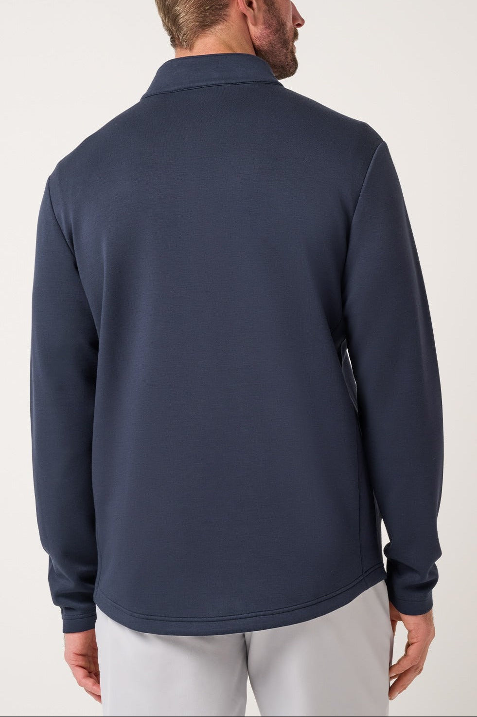 Travis Mathew Fibercloud Quarter Zip in Total Eclipse, back view