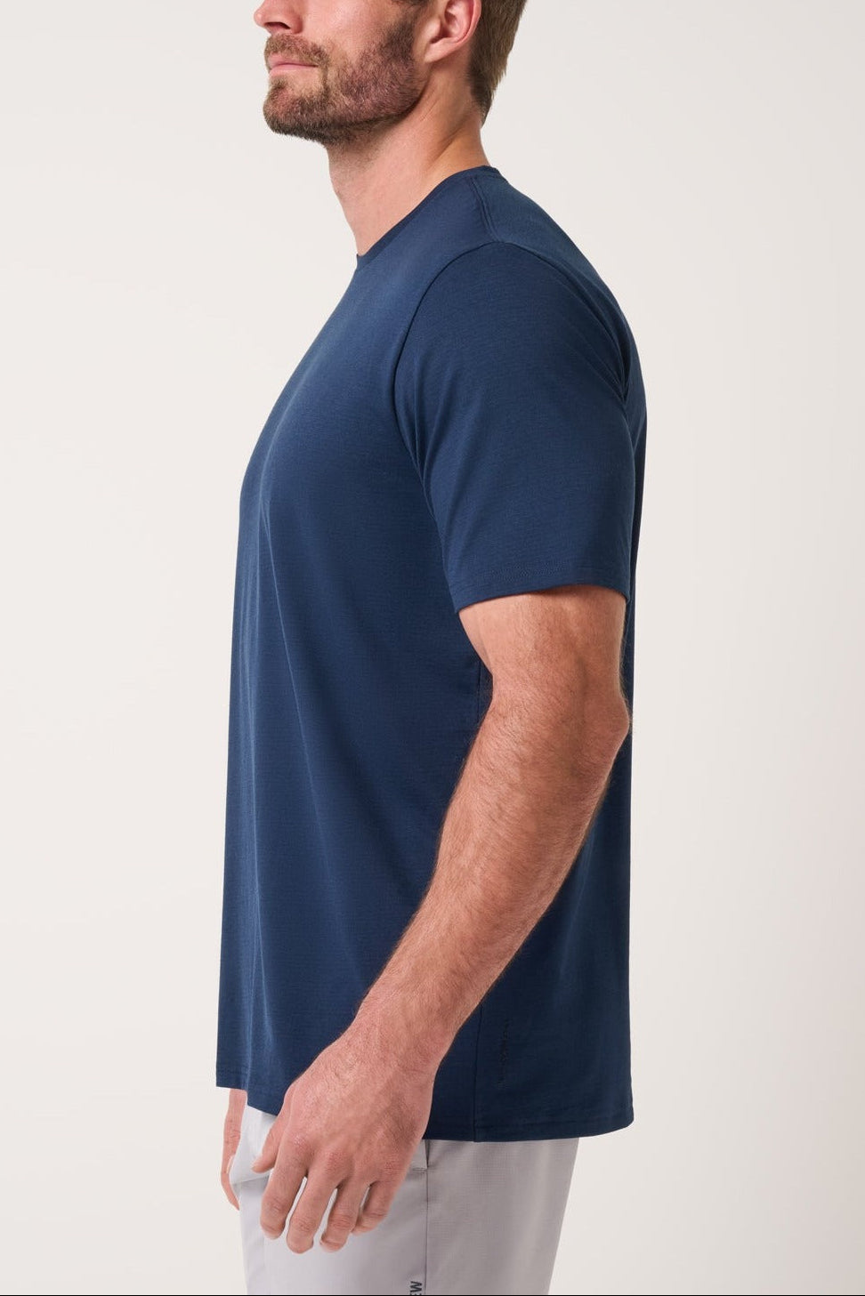 Travis Mathew Heater Series Jersey Tee in Total Eclipse, side view