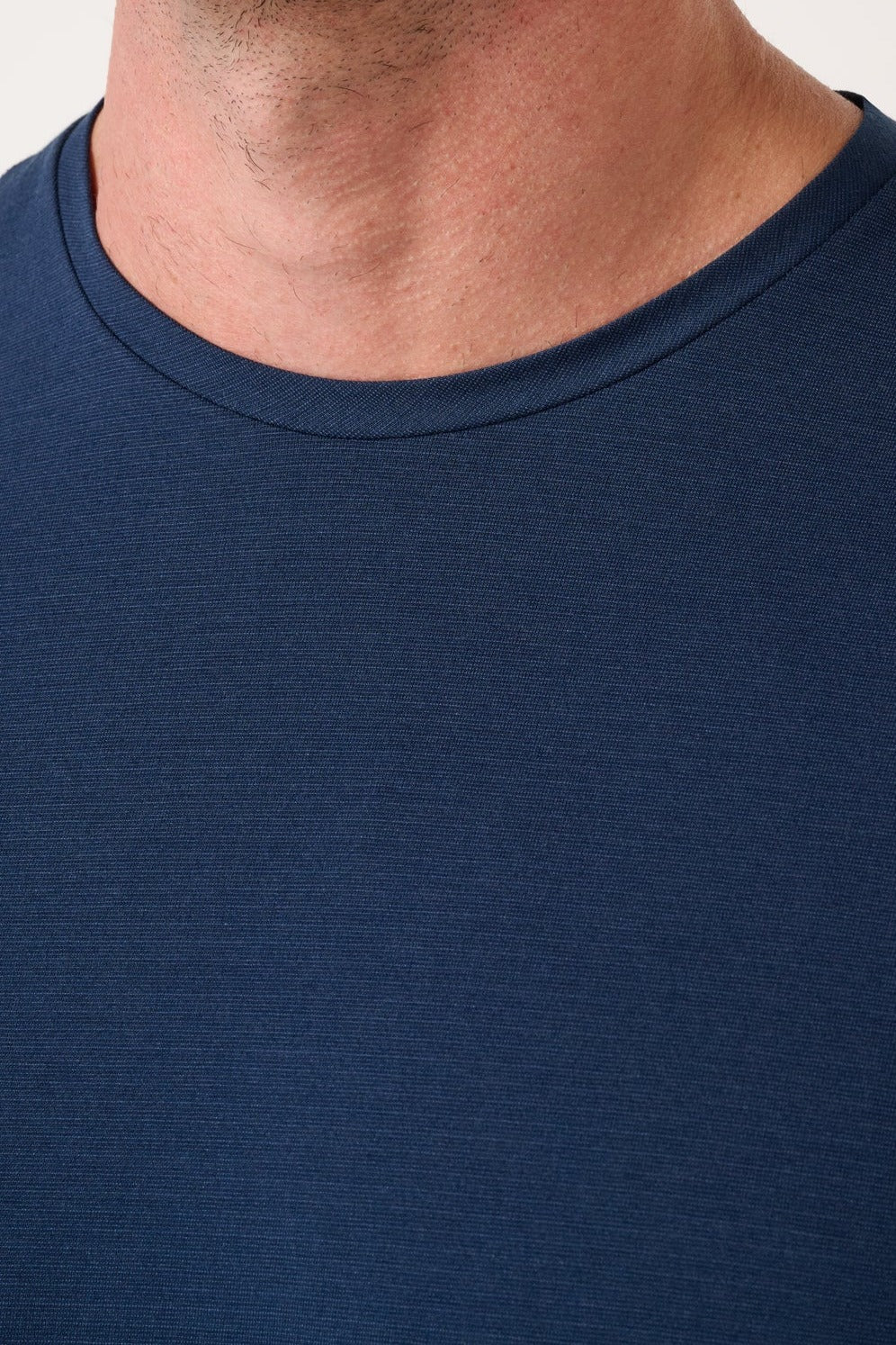 Travis Mathew Heater Series Jersey Tee in Total Eclipse, detail view