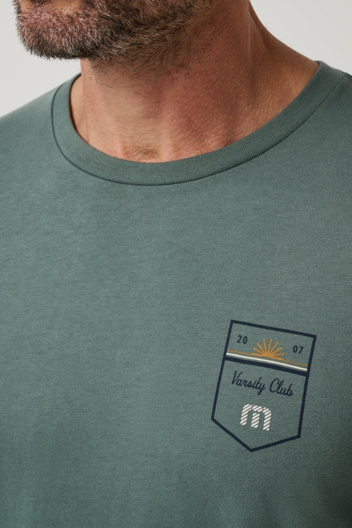 Club Charm Tee in Balsam Green, chest pocket detail