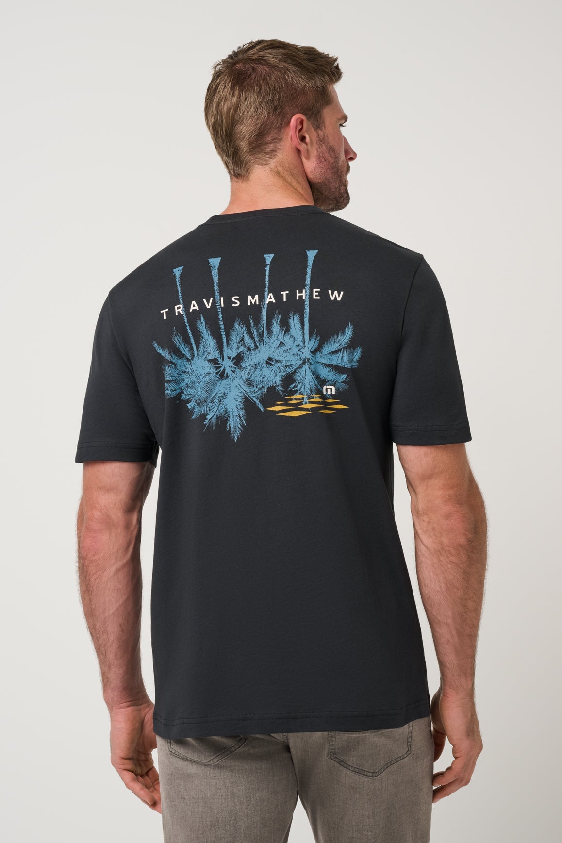Travis Mathew Sundown Soiree Tee in Black, back