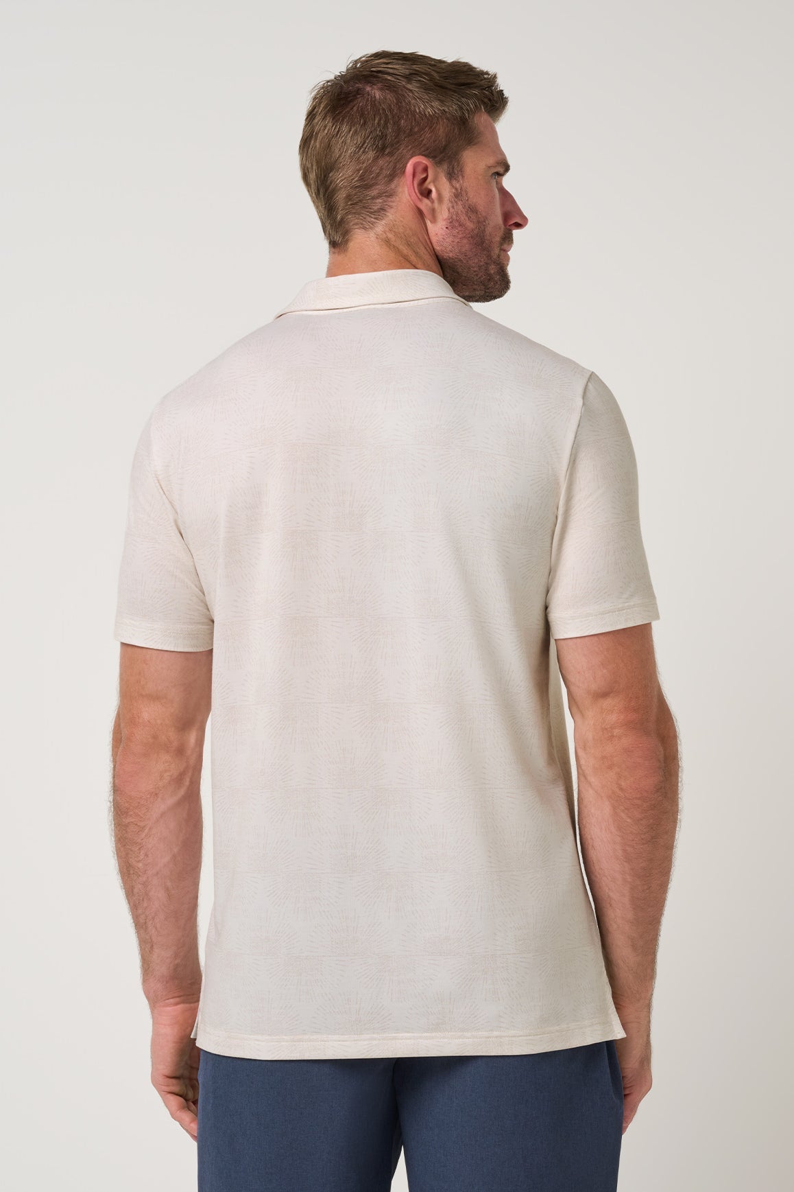 Travis Mathew Featherweight Terrace Polo in Antique White, back