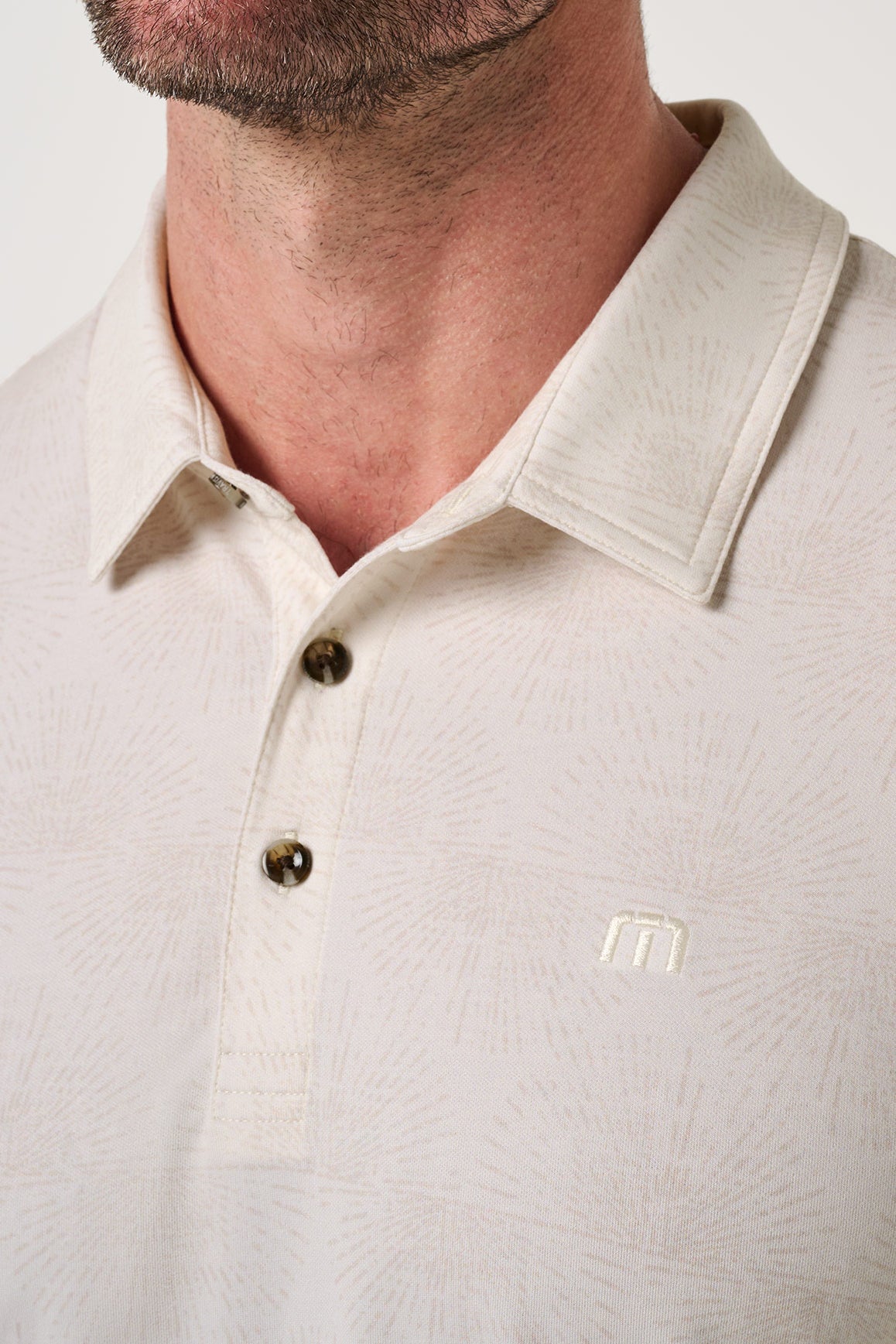 Travis Mathew Featherweight Terrace Polo in Antique White, collar detail