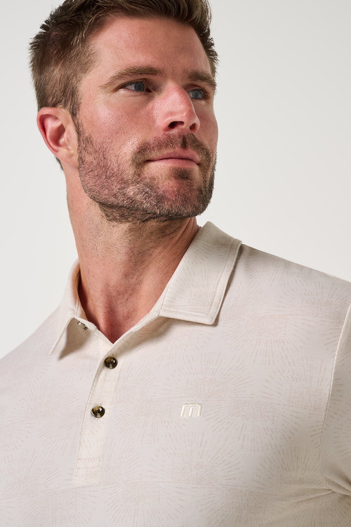 Travis Mathew Featherweight Terrace Polo in Antique White, print detail