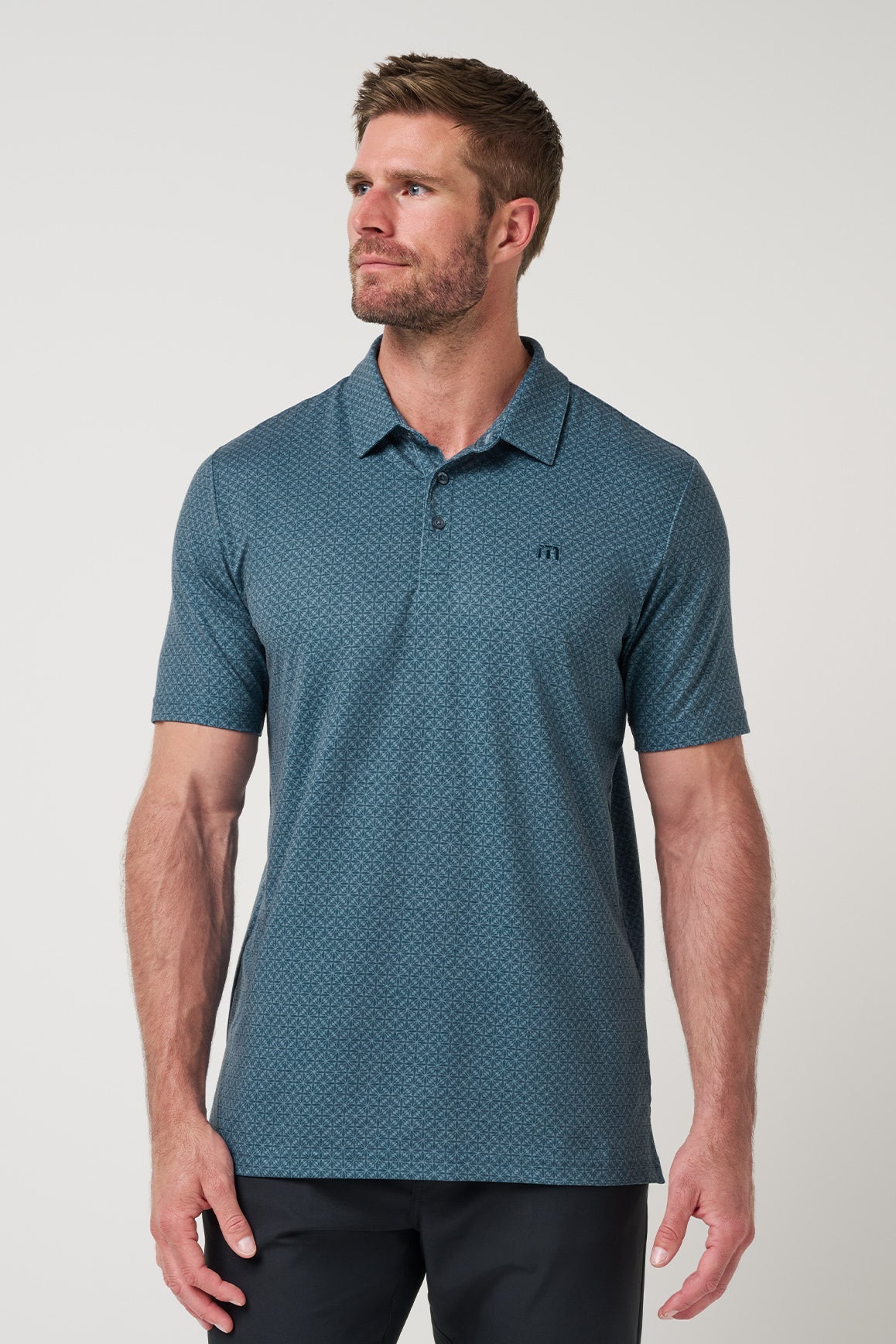 Travis Mathew Featherweight Flair Polo in Aegean, front