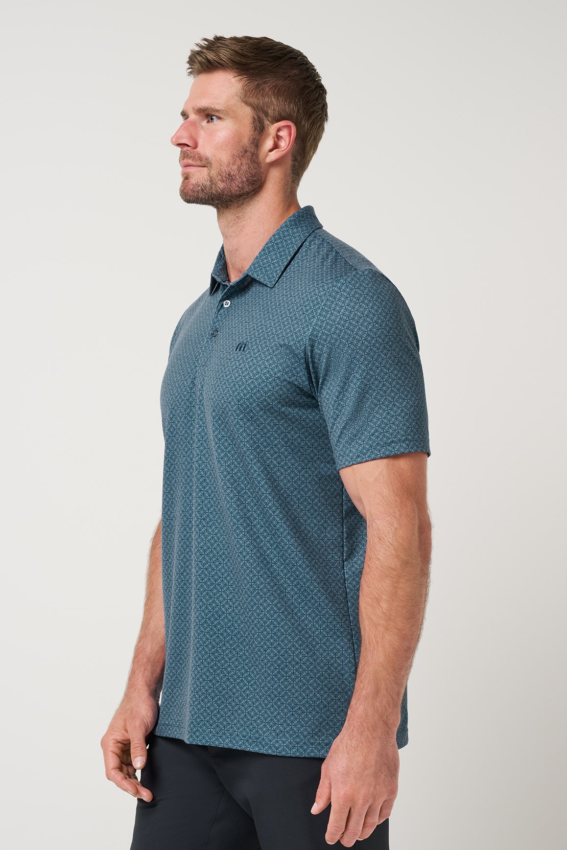 Travis Mathew Featherweight Flair Polo in Aegean, side