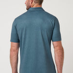 Travis Mathew Featherweight Flair Polo in Aegean, back