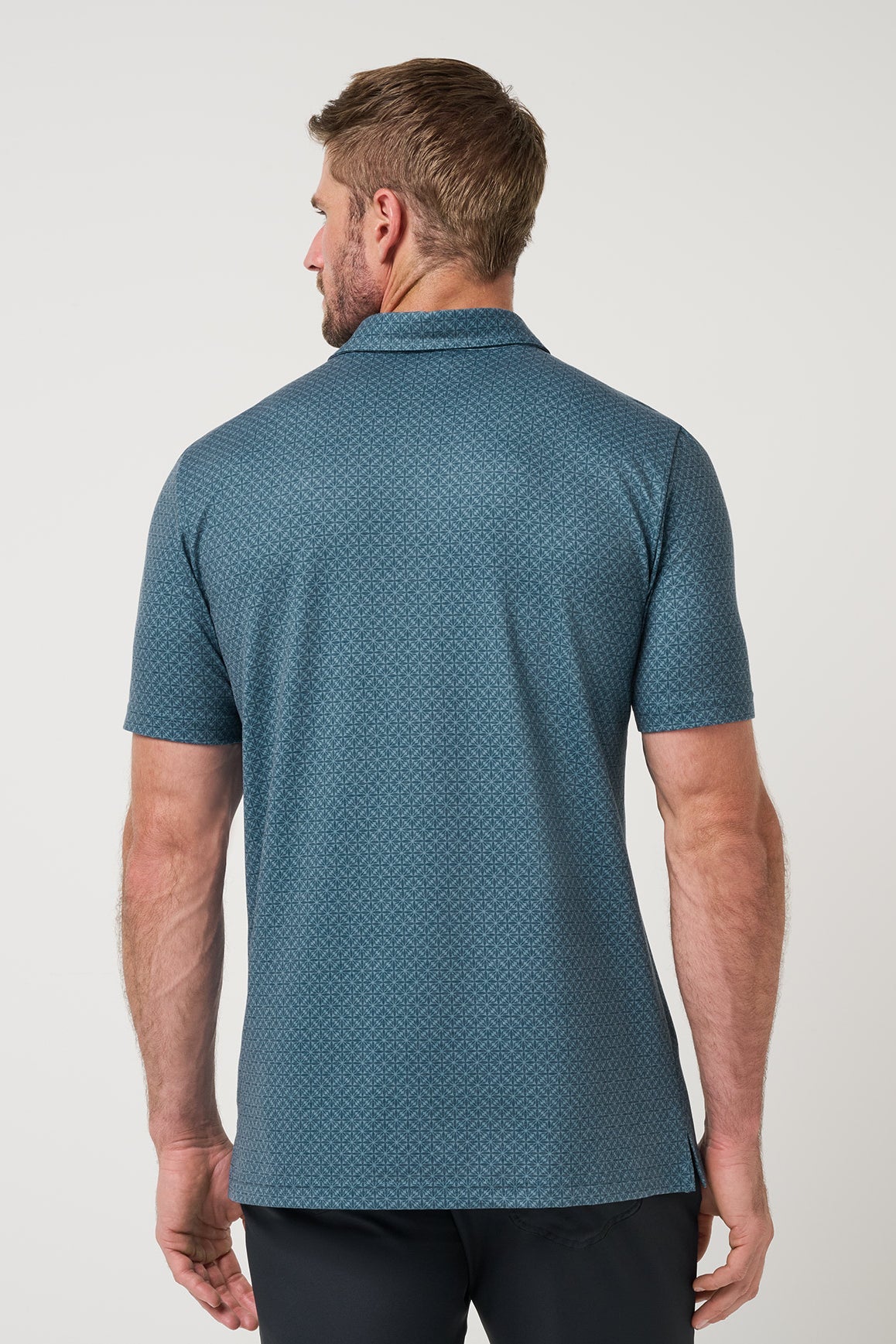 Travis Mathew Featherweight Flair Polo in Aegean, back