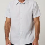 Travis Mathew Techwoven Flair Button-Up in White, front view