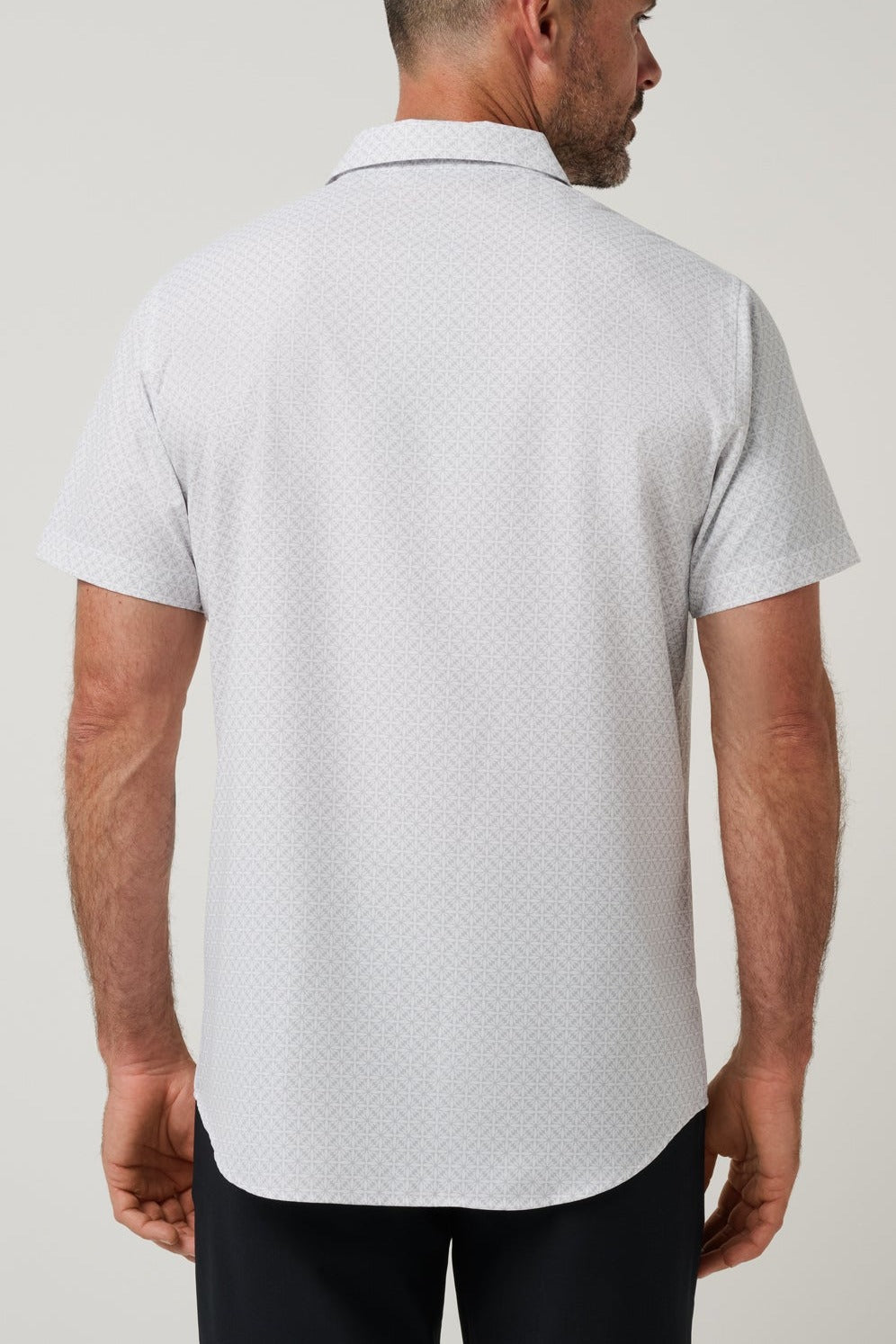 Travis Mathew Techwoven Flair Button-Up in White, back view